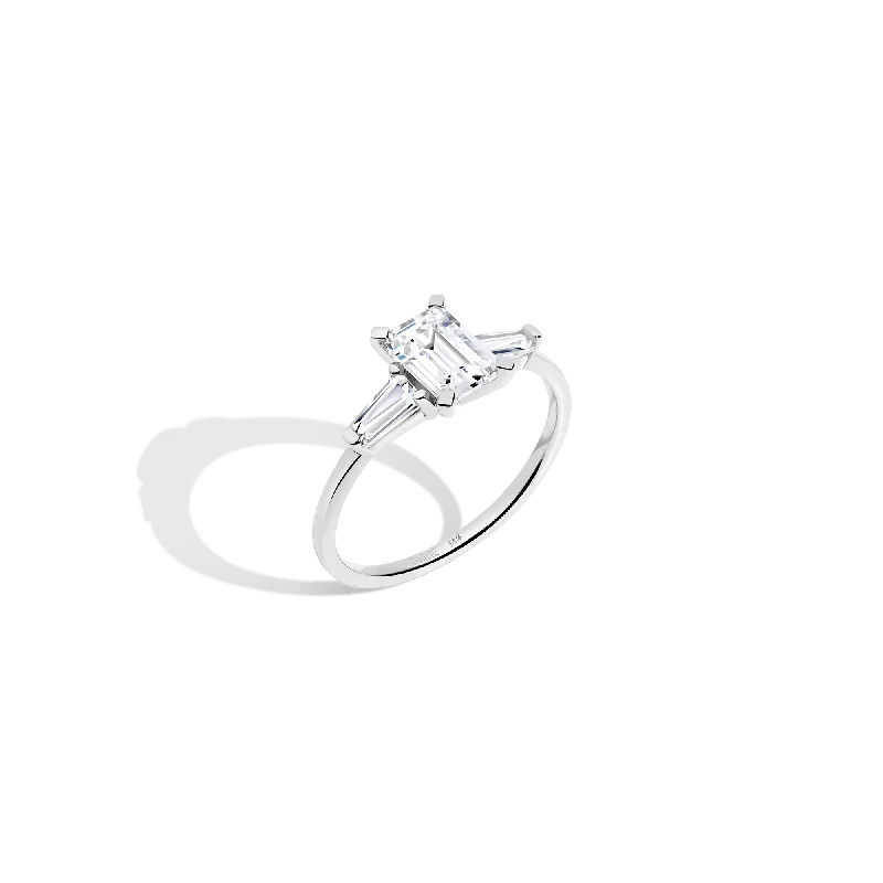 Men's Tanzanite Engagement Rings in Palladium with a Three - Stone ArrangementEmerald-Cut Tapered Baguette Diamond Ring