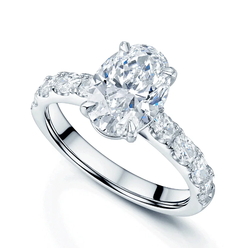 Men's Ruby Engagement Rings in Rose Gold with a Solitaire Design for a Romantic GesturePlatinum GIA Certificated 2.51 Carat Oval Cut Diamond Single Stone Ring With Oval Cut Diamond Shoulders