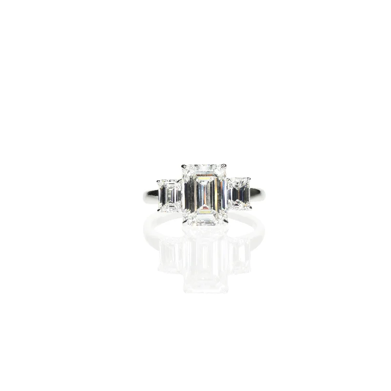 Men's Ruby Engagement Rings in Rose Gold with a Solitaire Design for a Romantic GestureEmerald cut Triology Ring Men's Ruby Engagement Rings in Rose Gold with a Solitaire Design for a Romantic GestureEmerald cut Triology Ring