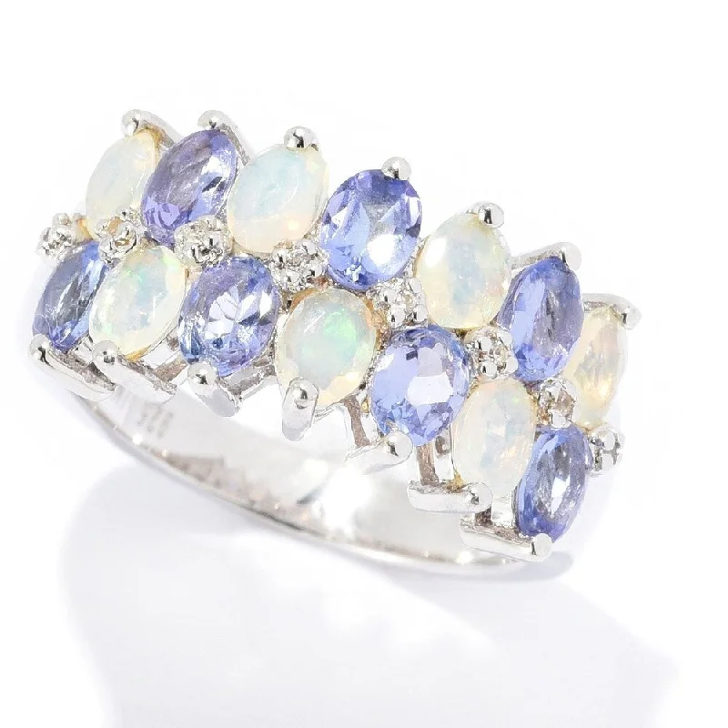 Tanzanite Gemstone Rings in 10K Gold with a Trilogy Design for a Sophisticated GiftSterling Silver Ethiopian Opal, Tanzanite & White Zircon Band Ring Tanzanite Gemstone Rings in 10K Gold with a Trilogy Design for a Sophisticated GiftSterling Silver Ethiopian Opal, Tanzanite & White Zircon Band Ring
