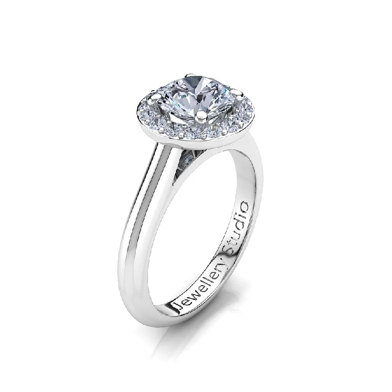 Men's Tanzanite Engagement Rings in Palladium with a Three - Stone ArrangementHalo Engagement Ring with 1.00ct Round Brilliant Cut Diamond