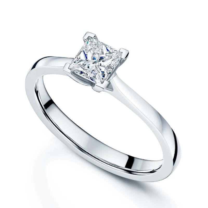 Men's Tanzanite Engagement Rings in Palladium with a Three - Stone ArrangementPlatinum GIA Certificated Princess Cut Diamond Ring With A Four Claw Setting Men's Tanzanite Engagement Rings in Palladium with a Three - Stone ArrangementPlatinum GIA Certificated Princess Cut Diamond Ring With A Four Claw Setting
