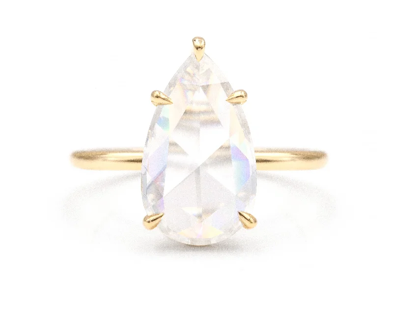 Men's Ruby Engagement Rings in Rose Gold with a Solitaire Design for a Romantic GestureRose Cut Pear Moissanite Solitaire Ring Men's Ruby Engagement Rings in Rose Gold with a Solitaire Design for a Romantic GestureRose Cut Pear Moissanite Solitaire Ring