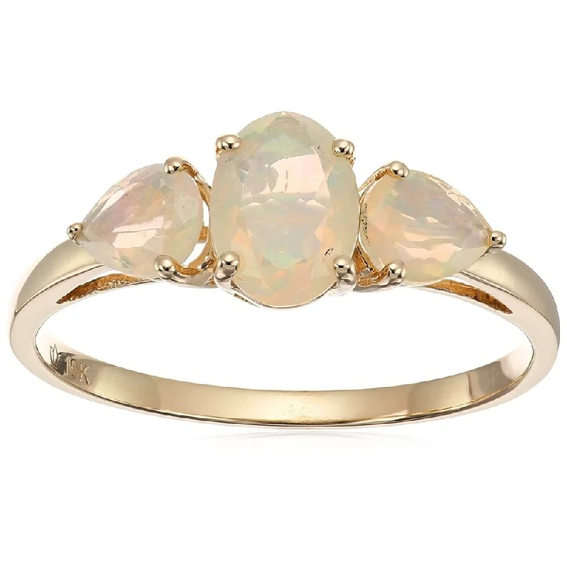 Iolite Gemstone Rings in 10K Gold with a Twisted Band for a Distinctive and Stylish Accessory10k Yellow Gold Ethiopian Opal Oval and Pear 3-Stone Ring, Size 7 - White Iolite Gemstone Rings in 10K Gold with a Twisted Band for a Distinctive and Stylish Accessory10k Yellow Gold Ethiopian Opal Oval and Pear 3-Stone Ring, Size 7 - White