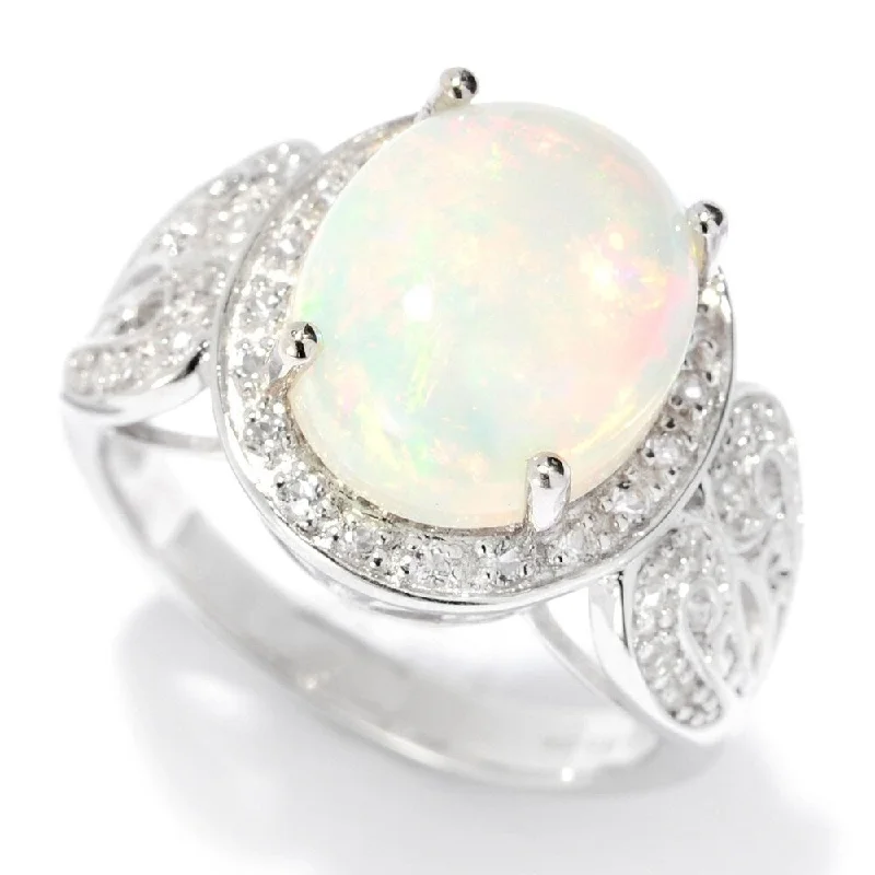 Opal Gemstone Rings in Rose Gold with a Milgrain Edge for a Feminine and Romantic StyleSterling Silver 12 x 10mm Oval Ethiopian Opal & White Topaz Ring Opal Gemstone Rings in Rose Gold with a Milgrain Edge for a Feminine and Romantic StyleSterling Silver 12 x 10mm Oval Ethiopian Opal & White Topaz Ring